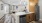 a kitchen with wood cabinets and stainless steel appliances