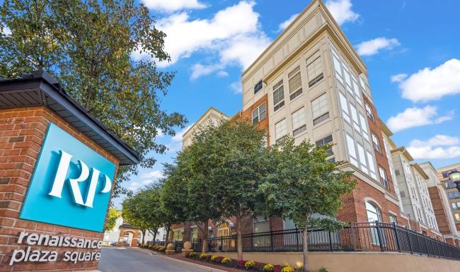 Find your perfect fit at Renaissance Plaza Square a building with trees and a sign